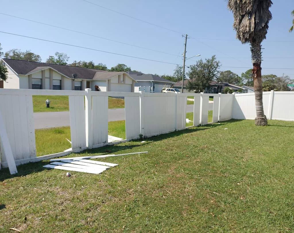 Fence damaged by Hurricane Hilton, about to undergo fence repair by Platinum's Works Corp.