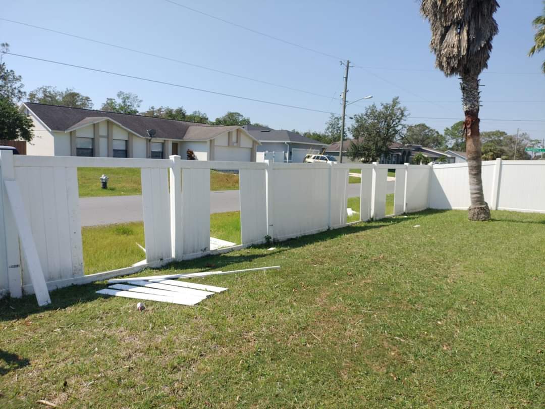 Fence damaged by Hurricane Hilton, about to undergo fence repair by Platinum's Works Corp.